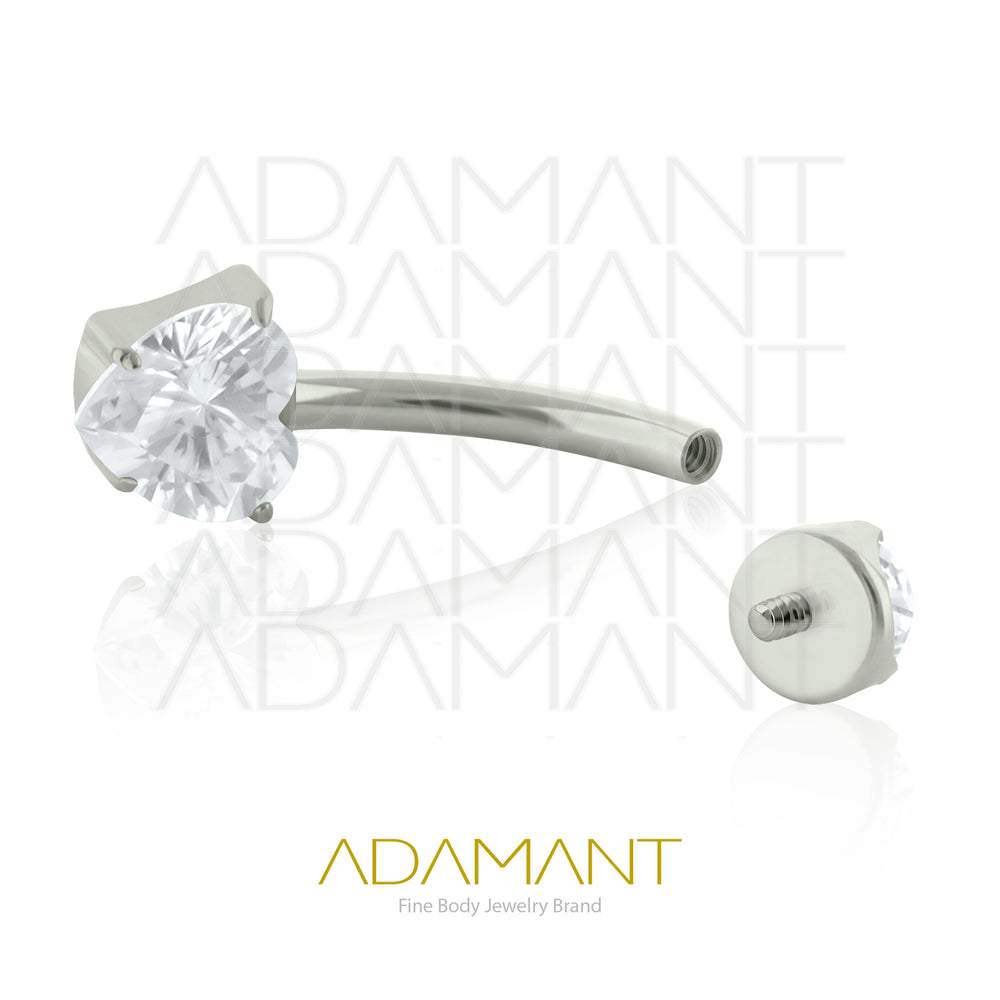 14g, Titanio Navel Curved, Rosca Interna, 1.2mm Patrón de Rosca, Ombligo Heart Rounded Gem, Prong Set 4, Cubic Zirconia.